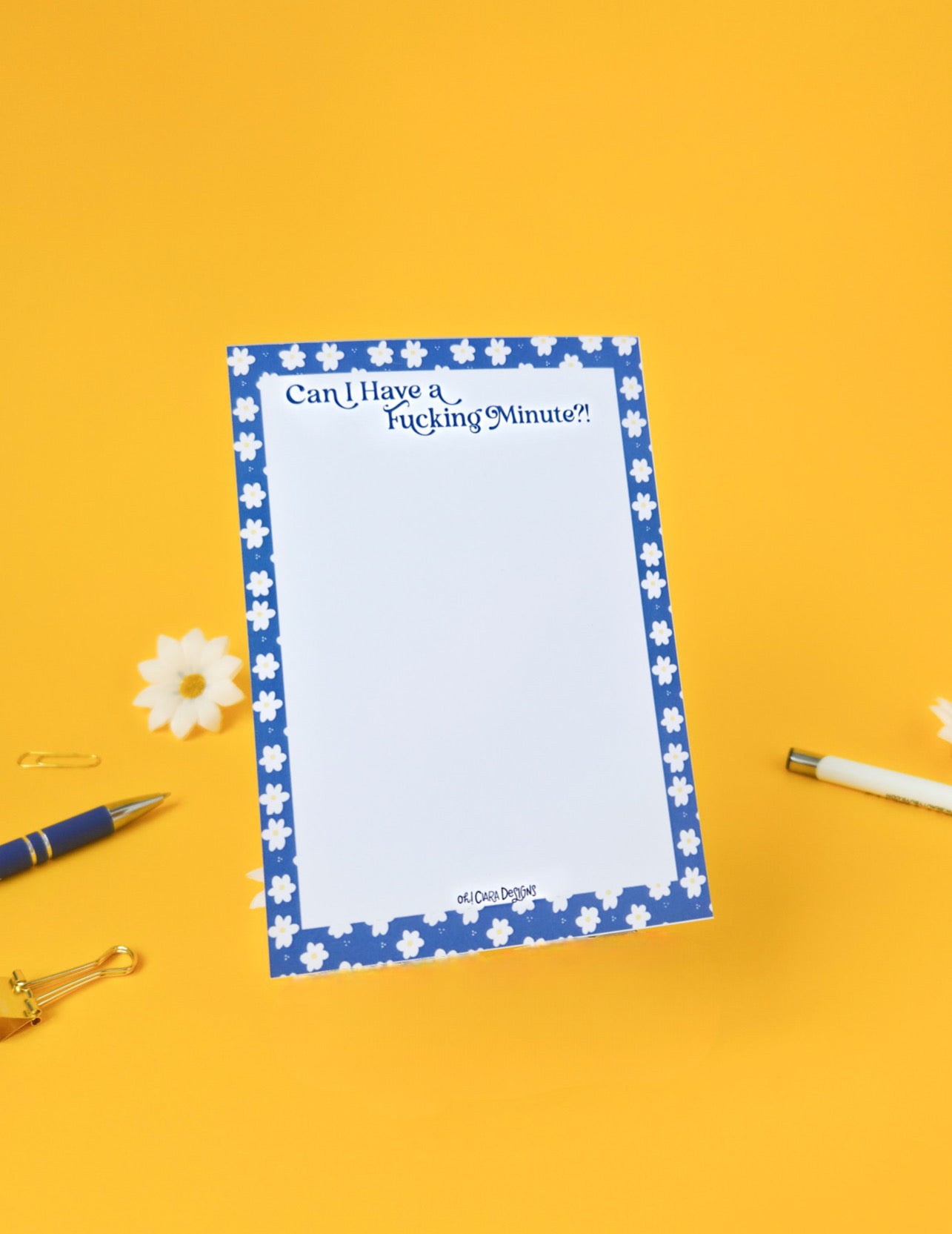 Notepad with text on a yellow background